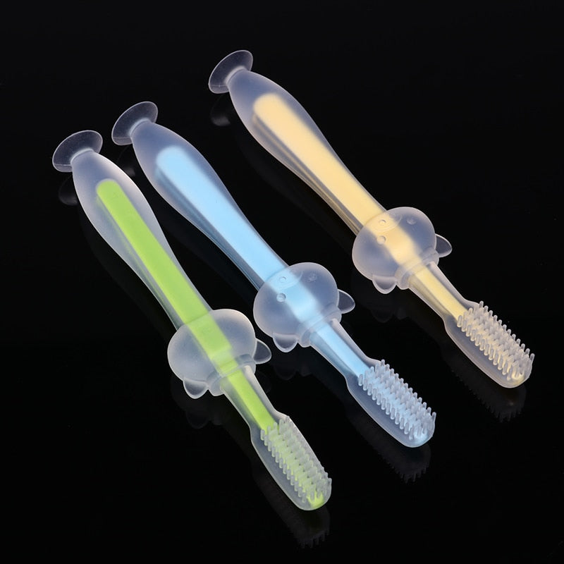 Escova de dentes de silicone macia treinando escovação higiene bucal